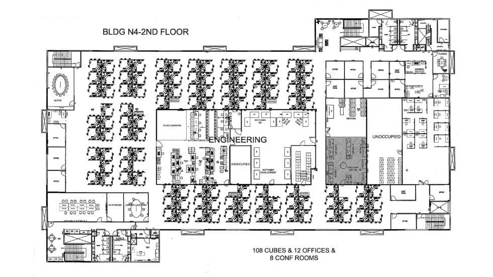 Modern office floor plan with multiple workstations, conference rooms, and designated areas for engineering and administrative teams. Ideal for corporate workspace design and office layout optimization.